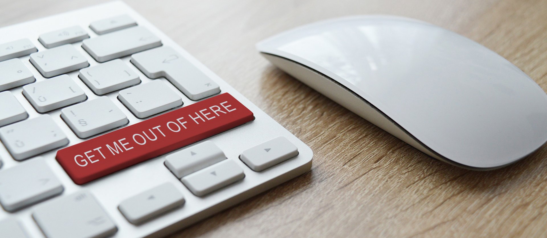 image of a keyboard with a button that says get me out of here