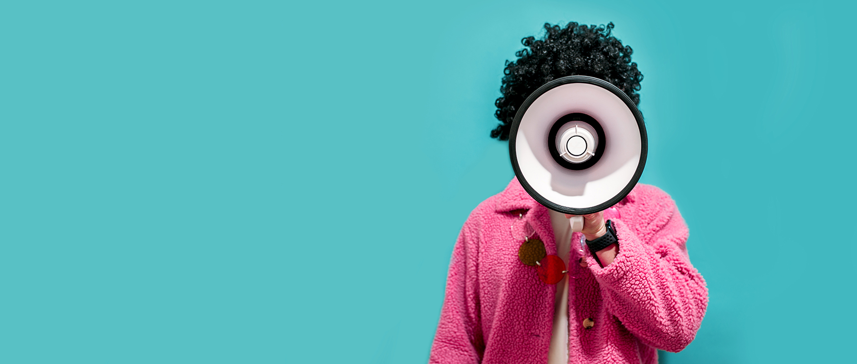 person talking into megaphone