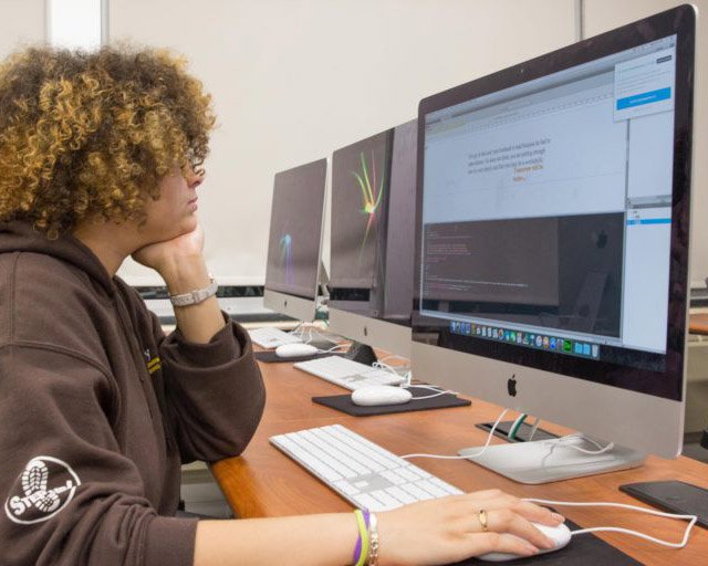 student in a computer lab